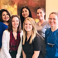 Doctor Boehmer with her Albuquerque dental team