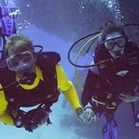 Doctor Boehmer and husband scuba diving