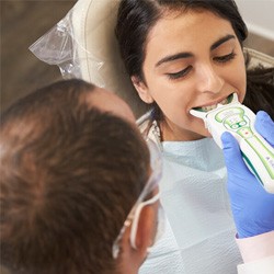 patient receiving T scan of their mouth