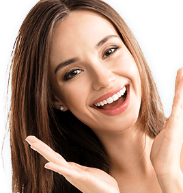 Smiling young woman gesturing to her face