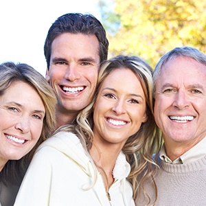 Family smiling after visiting family dentist in Albuquerque