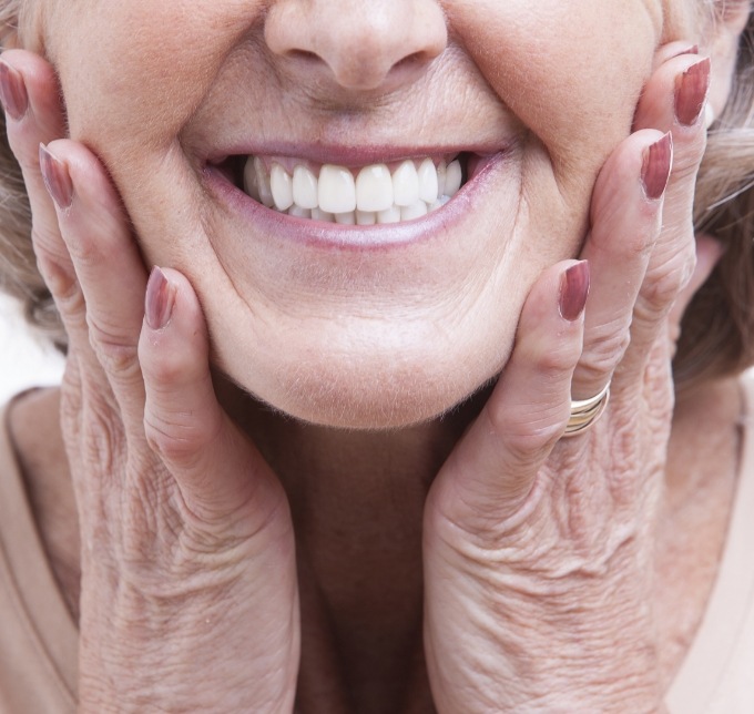 Close up of senior womans face while shes smiling