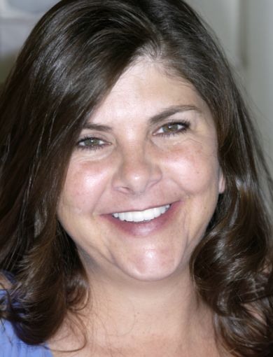 Brown haired woman smiling
