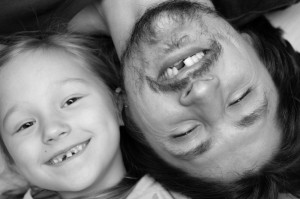 father and daughter with matching missing teeth need to visit the dentist Albuquerque residents trust