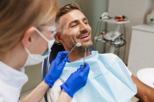 a man in a dentist chair