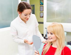 a female patient with her dentist