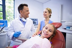 mother and daughter at the dentist’s office