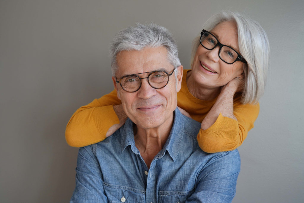 couple with dental implants