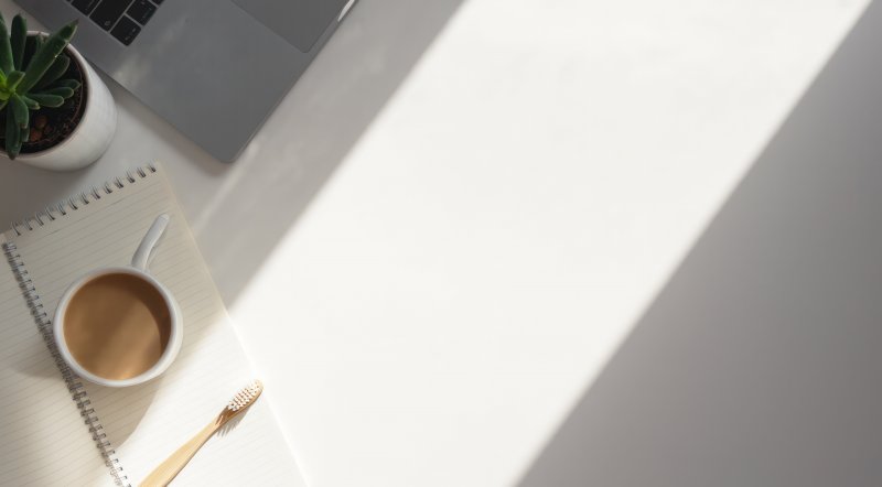 a toothbrush on a desk workspace